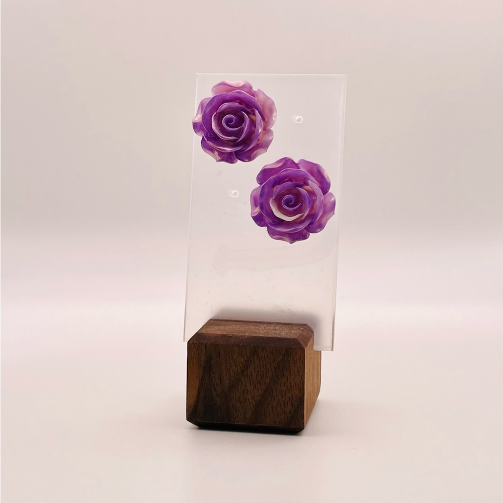 Purple roses are associated with royalty
